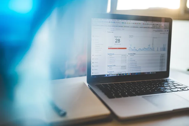Laptop displaying Google Analytics in a modern workspace, highlighting digital analytics and technology. How to map affiliate marketing commercial opportunities