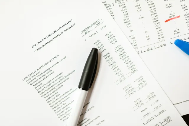Financial documents featuring cash flows and pens, ideal for business themes and analysis. Affiliate marketing key metrics without the vanity numbers